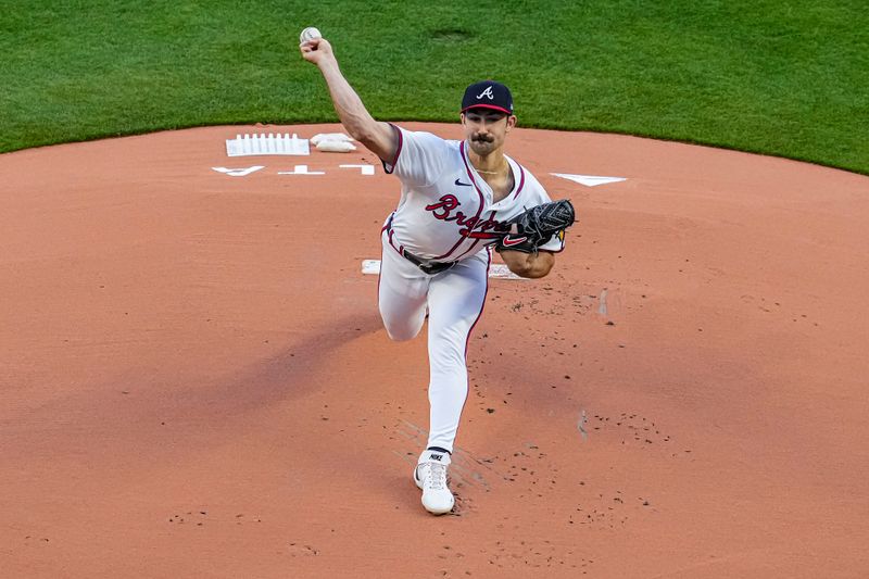 Apr 5, 2024; Cumberland, Georgia, USA; Atlanta Braves pitcher Spencer Strider (99) pitches against the Arizona Diamondbacks during the first inning at Truist Park. Mandatory Credit: Dale Zanine-USA TODAY Sports