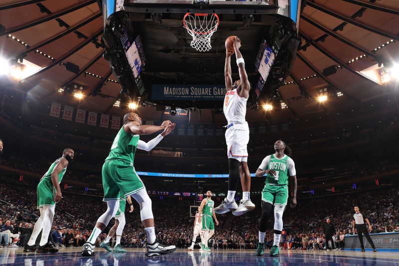 NEW YORK, NY - May 10:    OG Anunoby #8 of the New York Knicks dunks the ball during the game against the Boston Celtics  during Round 2 Game 3 of the 2025 NBA Playoffs  on May 10, 2025 at Madison Square Garden in New York City, New York.  NOTE TO USER: User expressly acknowledges and agrees that, by downloading and or using this photograph, User is consenting to the terms and conditions of the Getty Images License Agreement. Mandatory Copyright Notice: Copyright 2025 NBAE  (Photo by Nathaniel S. Butler/NBAE via Getty Images)