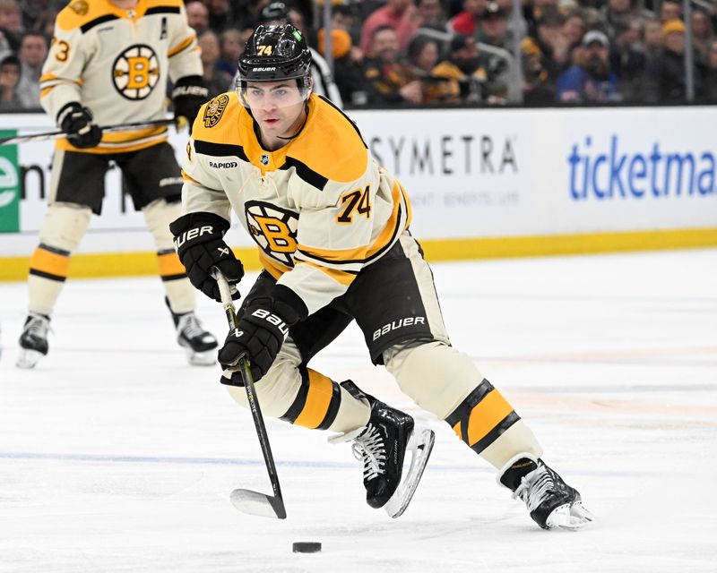 Mar 21, 2024; Boston, Massachusetts, USA; Boston Bruins left wing Jake DeBrusk (74) skates with the puck against the New York Rangers during the first period at the TD Garden. Mandatory Credit: Brian Fluharty-USA TODAY Sports