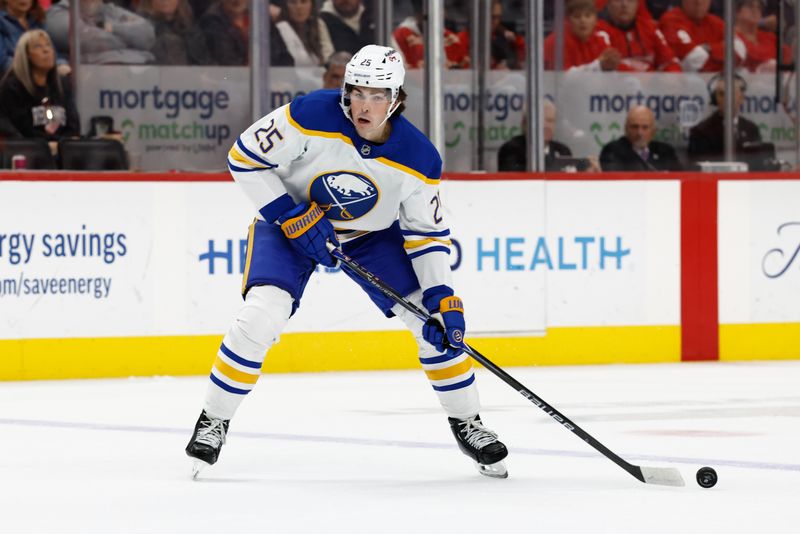 Nov 15, 2025; Detroit, Michigan, USA;  Buffalo Sabres defenseman Owen Power (25) skates with the puck in the first period against the Detroit Red Wings at Little Caesars Arena. Mandatory Credit: Rick Osentoski-Imagn Images