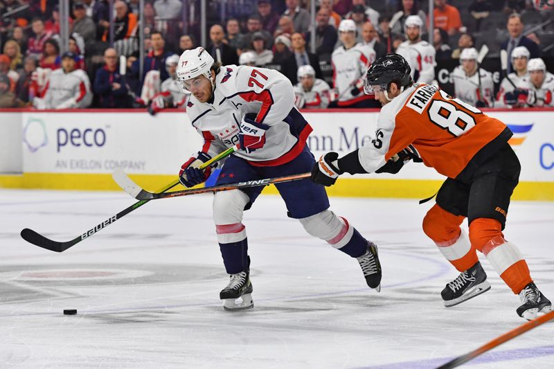 Apr 16, 2024; Philadelphia, Pennsylvania, USA; Washington Capitals right wing T.J. Oshie (77) controls the ouck against Philadelphia Flyers left wing Joel Farabee (86) during the third period at Wells Fargo Center. Mandatory Credit: Eric Hartline-USA TODAY Sports