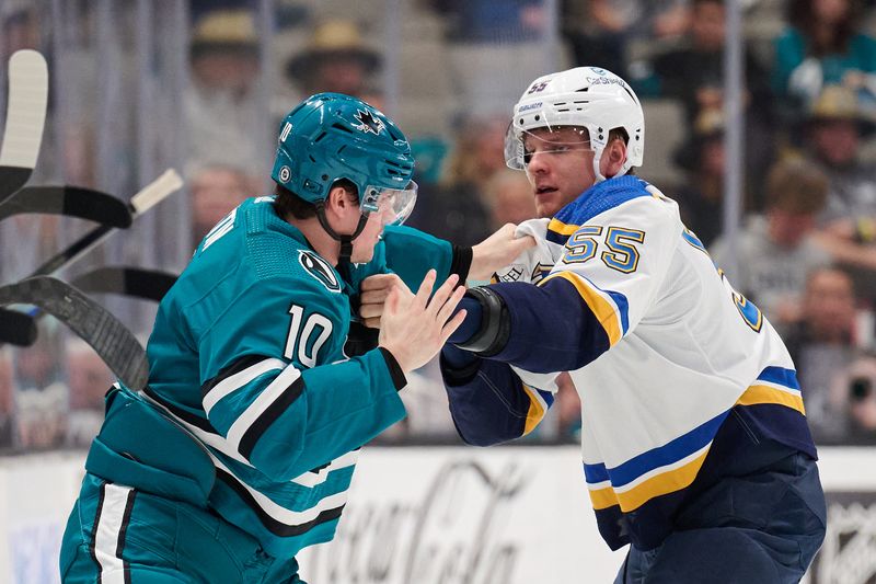 Apr 6, 2024; San Jose, California, USA; San Jose Sharks center Klim Kostin (10) fights St. Louis Blues defenseman Colton Parayko (55) during the third period at SAP Center at San Jose. Mandatory Credit: Robert Edwards-USA TODAY Sports