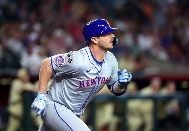 Aug 27, 2024; Phoenix, Arizona, USA; New York Mets first baseman Pete Alonso hits a solo home run in the second inning against the Arizona Diamondbacks at Chase Field. Mandatory Credit: Mark J. Rebilas-USA TODAY Sports