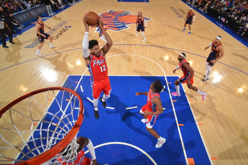 NEW YORK, NY - APRIL 22: Tobias Harris #12 of the Philadelphia 76ers rebounds the ball during the game against the New York Knicks during Round 1 Game 2 of the 2024 NBA Playoffs on April 22, 2024 at Madison Square Garden in New York City, New York.  NOTE TO USER: User expressly acknowledges and agrees that, by downloading and or using this photograph, User is consenting to the terms and conditions of the Getty Images License Agreement. Mandatory Copyright Notice: Copyright 2024 NBAE  (Photo by Jesse D. Garrabrant/NBAE via Getty Images)