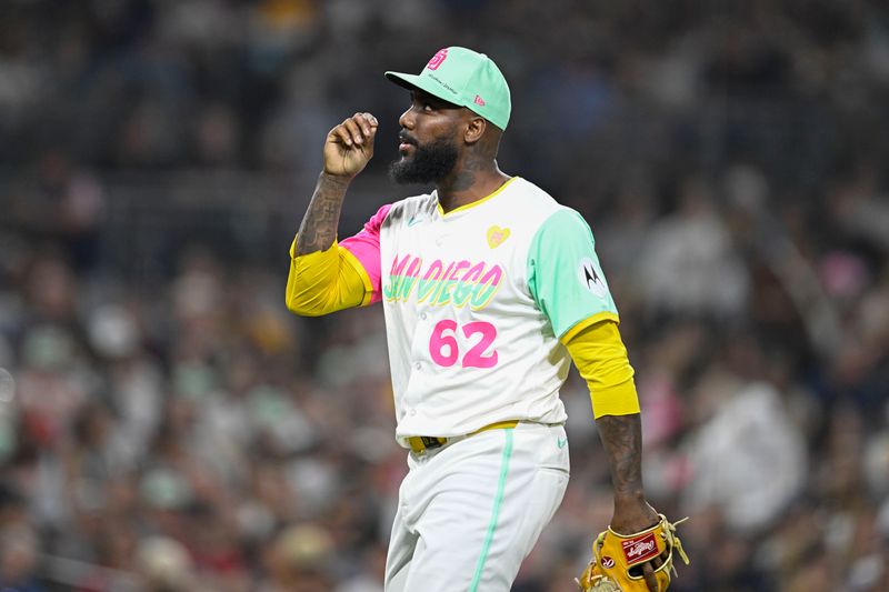 July 5, 2024; San Diego, California, USA;San Diego Padres relief pitcher Enyel De Los Santos (62) looks skyward after pitching during the eighth inning against the Arizona Diamondbacks at Petco Park. Mandatory Credit: Denis Poroy-USA TODAY Sports