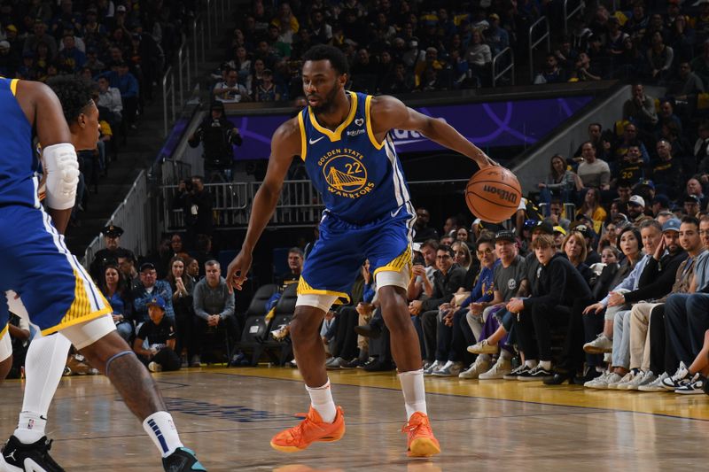 SAN FRANCISCO, CA - FEBRUARY 25:  Andrew Wiggins #22 of the Golden State Warriors handles the ball during the game against the Denver Nuggets on February 25, 2024 at Chase Center in San Francisco, California. NOTE TO USER: User expressly acknowledges and agrees that, by downloading and or using this photograph, user is consenting to the terms and conditions of Getty Images License Agreement. Mandatory Copyright Notice: Copyright 2024 NBAE (Photo by Noah Graham/NBAE via Getty Images)