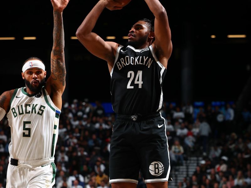 BROOKLYN, NY - OCTOBER 27: Cam Thomas #24 of the Brooklyn Nets shoots a three point basket during the game against the Milwaukee Bucks on October 27, 2024 at Barclays Center in Brooklyn, New York. NOTE TO USER: User expressly acknowledges and agrees that, by downloading and or using this Photograph, user is consenting to the terms and conditions of the Getty Images License Agreement. Mandatory Copyright Notice: Copyright 2024 NBAE (Photo by David L. Nemec/NBAE via Getty Images)