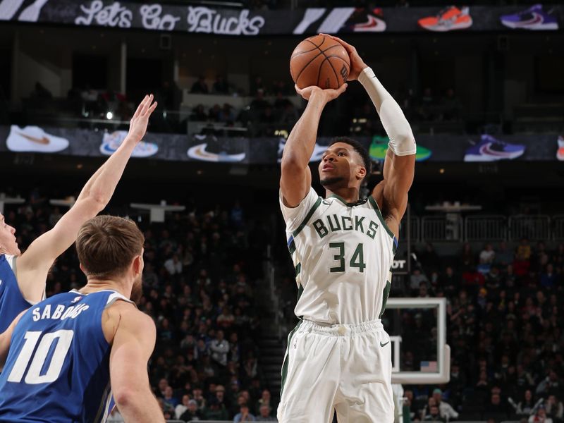 MILWAUKEE, WI - JANUARY 14: Giannis Antetokounmpo #34 of the Milwaukee Bucks shoots the ball during the game against the Sacramento Kings on January 14, 2024 at the Fiserv Forum Center in Milwaukee, Wisconsin. NOTE TO USER: User expressly acknowledges and agrees that, by downloading and or using this Photograph, user is consenting to the terms and conditions of the Getty Images License Agreement. Mandatory Copyright Notice: Copyright 2024 NBAE (Photo by Gary Dineen/NBAE via Getty Images).