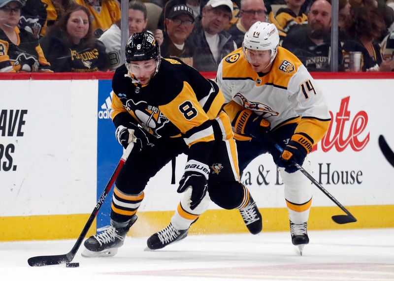 Apr 15, 2024; Pittsburgh, Pennsylvania, USA;  Pittsburgh Penguins left wing Michael Bunting (8) moves the puck ahedad of Nashville Predators center Gustav Nyquist (14) during the first period at PPG Paints Arena. The Penguins won 4-2. Mandatory Credit: Charles LeClaire-USA TODAY Sports