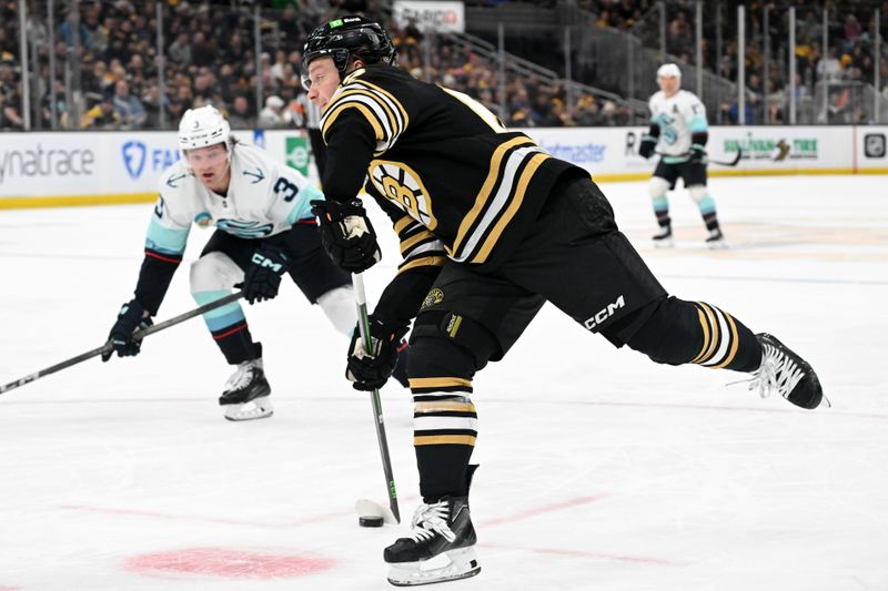 Feb 15, 2024; Boston, Massachusetts, USA; Boston Bruins center Oskar Steen #62 takes a shot against the Seattle Kraken during the first period at TD Garden. Mandatory Credit: Brian Fluharty-USA TODAY Sports