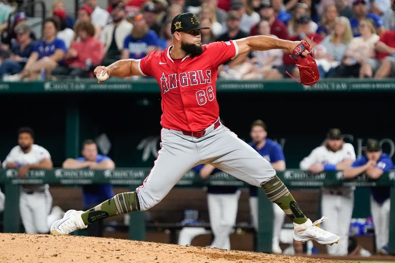 May 18, 2024; Arlington, Texas, USA; Los Angeles Angels relief pitcher Luis Garcia (66) throws to the plate during the eighth inning against the Texas Rangers at Globe Life Field. Mandatory Credit: Raymond Carlin III-USA TODAY Sports