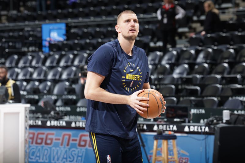 SALT LAKE CITY, UT - WEDNESDAY 27: Nikola Jokic #15 of the Denver Nuggets warms up before the game against the Utah Jazz on Wednesday 27, 2024 at vivint.SmartHome Arena in Salt Lake City, Utah. NOTE TO USER: User expressly acknowledges and agrees that, by downloading and or using this Photograph, User is consenting to the terms and conditions of the Getty Images License Agreement. Mandatory Copyright Notice: Copyright 2024 NBAE (Photo by Melissa Majchrzak/NBAE via Getty Images)