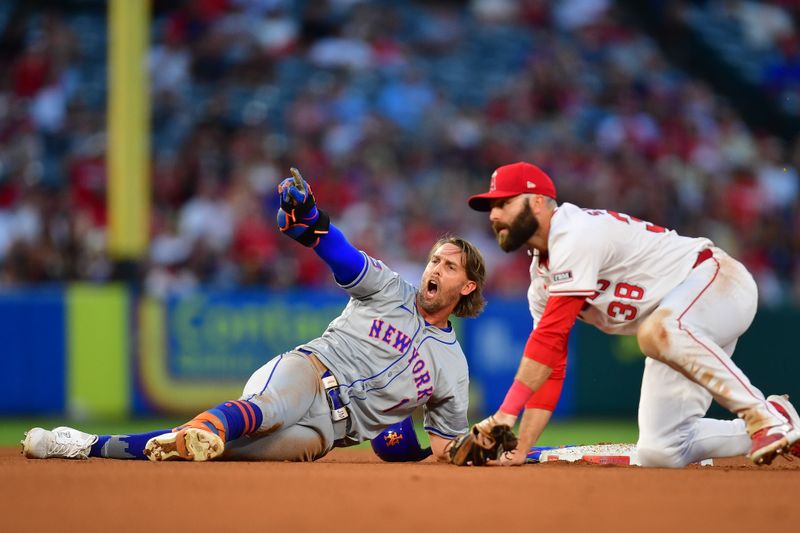 August 3, 2024; Anaheim, California, USA; New York Mets second baseman Jeff McNeil (1) is tagged out at second after stretching a single by Los Angeles Angels second baseman Michael Stefanic (38) during the fifth inning at Angel Stadium. McNeil would call for video review. Mandatory Credit: Gary A. Vasquez-USA TODAY Sports