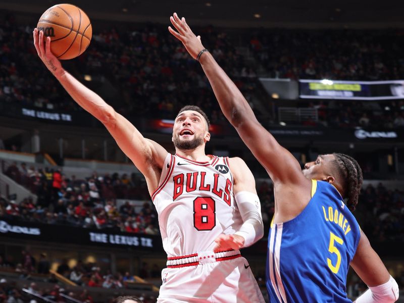 CHICAGO, IL - JANUARY 12: Zach LaVine #8 of the Chicago Bulls drives to the basket during the game against the Golden State Warriors on January 12, 2024 at United Center in Chicago, Illinois. NOTE TO USER: User expressly acknowledges and agrees that, by downloading and or using this photograph, User is consenting to the terms and conditions of the Getty Images License Agreement. Mandatory Copyright Notice: Copyright 2024 NBAE (Photo by Jeff Haynes/NBAE via Getty Images)