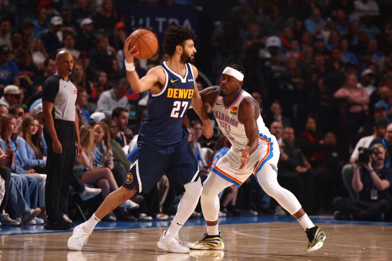 OKLAHOMA CITY, OK - MARCH 10: Luguentz Dort #5 of the Oklahoma City Thunder plays defense during the game against the Denver Nuggets on March 10, 2025 at Paycom Center in Oklahoma City, Oklahoma. NOTE TO USER: User expressly acknowledges and agrees that, by downloading and or using this photograph, User is consenting to the terms and conditions of the Getty Images License Agreement. Mandatory Copyright Notice: Copyright 2025 NBAE(Photo by Zach Beeker/NBAE via Getty Images)