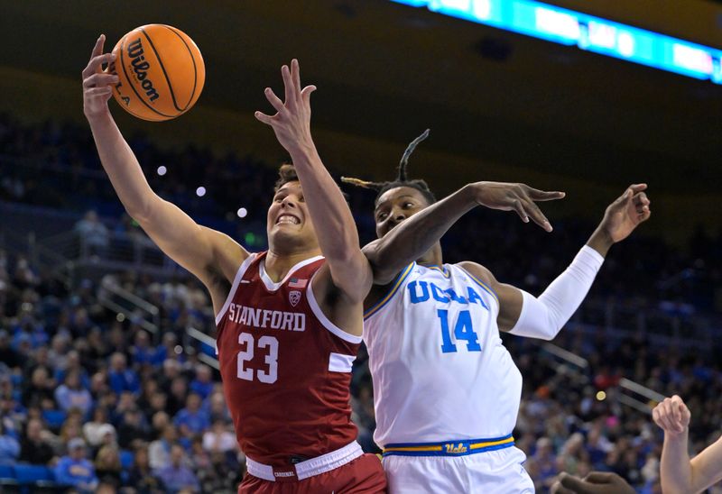 Feb 16, 2023; Los Angeles, California, USA; Stanford Cardinal forward Brandon Angel (23) reaches in front of UCLA Bruins forward Kenneth Nwuba (14) for a rebound in the first half at Pauley Pavilion presented by Wescom. Mandatory Credit: Jayne Kamin-Oncea-USA TODAY Sports