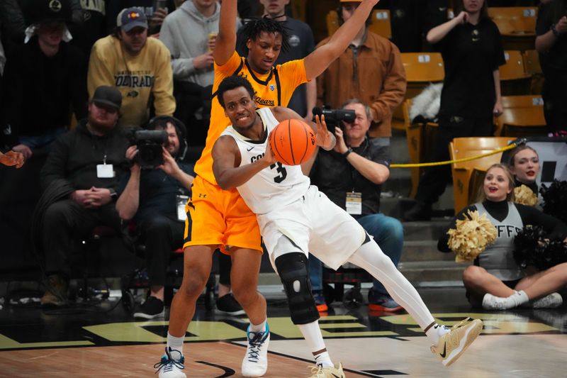 Feb 2, 2023; Boulder, Colorado, USA; California Golden Bears forward Grant Newell (14) defends Colorado Buffaloes guard Jalen Gabbidon (3) in the first half at the CU Events Center. Mandatory Credit: Ron Chenoy-USA TODAY Sports