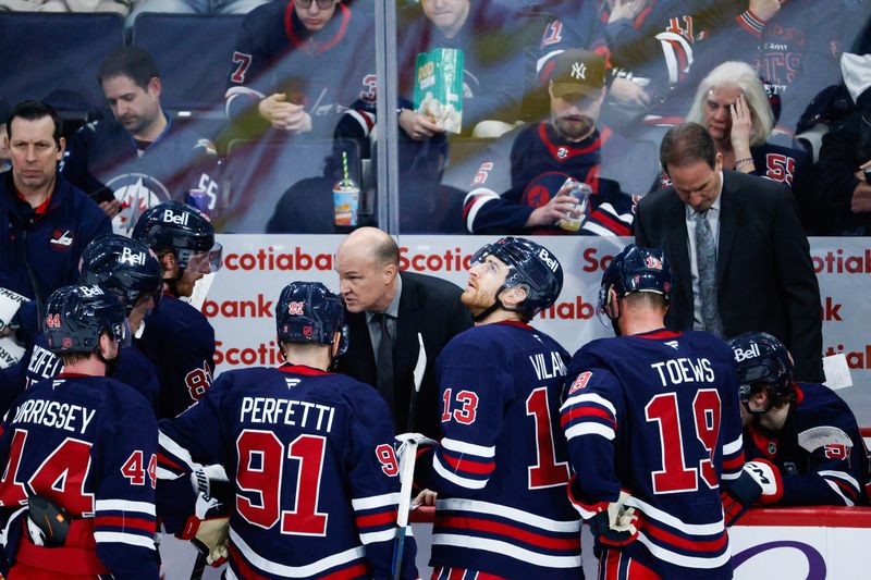 Mar 12, 2026; Winnipeg, Manitoba, CAN; Winnipeg Jets assistant coach Davis Payne reacts against the New York Rangers during the third period at Canada Life Centre. Mandatory Credit: Terrence Lee-Imagn Images