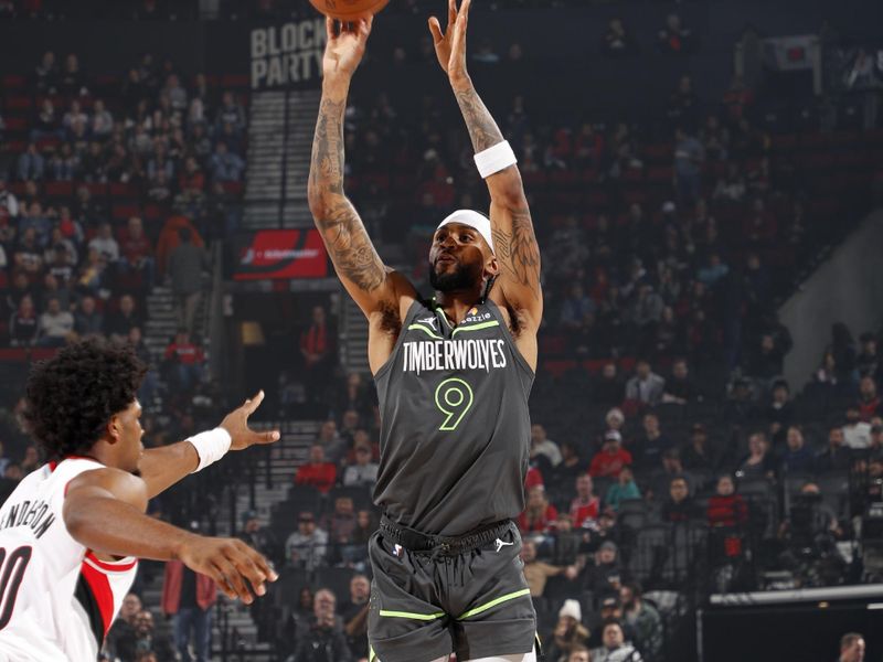 PORTLAND, OR - NOVEMBER 13: Nickeil Alexander-Walker #9 of the Minnesota Timberwolves three point basket during the game against the Portland Trail Blazers on November 13, 2024 at the Moda Center Arena in Portland, Oregon. NOTE TO USER: User expressly acknowledges and agrees that, by downloading and or using this photograph, user is consenting to the terms and conditions of the Getty Images License Agreement. Mandatory Copyright Notice: Copyright 2024 NBAE (Photo by Cameron Browne/NBAE via Getty Images)