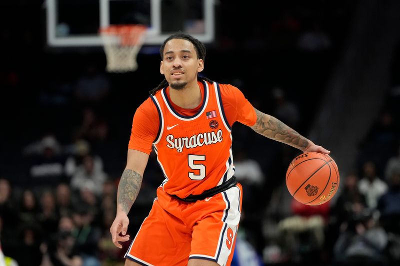 Mar 11, 2025; Charlotte, NC, USA; Syracuse Orange guard Jaquan Carlos (5) with the ball in the second half at Spectrum Center. Mandatory Credit: Bob Donnan-Imagn Images