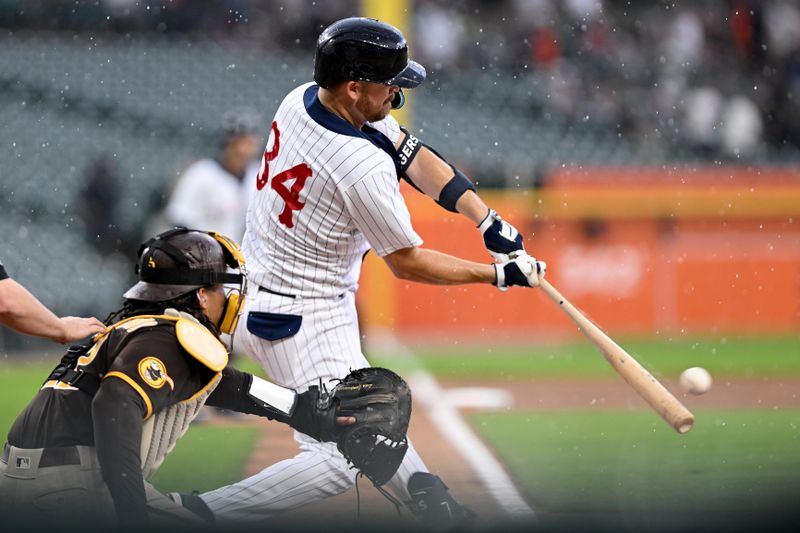 Jul 22, 2023; Detroit, Michigan, USA; Detroit Tigers catcher Jake Rogers (34) hits an RBI double in the second inning at Comerica Park. Mandatory Credit: Lon Horwedel-USA TODAY Sports