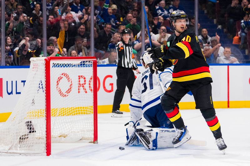 Jan 20, 2024; Vancouver, British Columbia, CAN; Vancouver Canucks forward Elias Pettersson (40) celebrates a goal against Toronto Maple Leafs goalie Martin Jones (31) in the third period at Rogers Arena. Canucks won 6-4. Mandatory Credit: Bob Frid-USA TODAY Sports