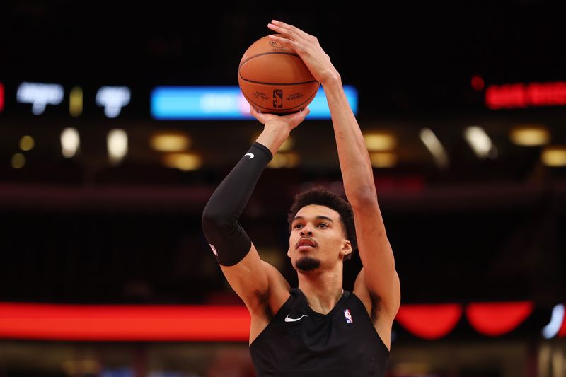 CHICAGO, ILLINOIS - JANUARY 06: Victor Wembanyama #1 of the San Antonio Spurs warms up prior to the game against the Chicago Bulls at the United Center on January 06, 2025 in Chicago, Illinois. NOTE TO USER: User expressly acknowledges and agrees that, by downloading and or using this photograph, User is consenting to the terms and conditions of the Getty Images License Agreement.  (Photo by Michael Reaves/Getty Images)