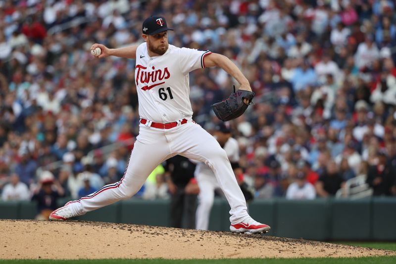 Oct 4, 2023; Minneapolis, Minnesota, USA; Minnesota Twins relief pitcher Brock Stewart (61) delivers a pitch in the seventh inning against the Toronto Blue Jays during game two of the Wildcard series for the 2023 MLB playoffs at Target Field. Mandatory Credit: Jesse Johnson-USA TODAY Sports