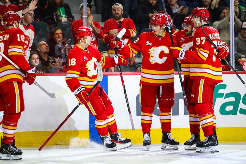 Jan 31, 2026; Calgary, Alberta, CAN; Calgary Flames right wing Matvei Gridin (92) celebrates his goal with teammates against the San Jose Sharks during the second period at Scotiabank Saddledome. Mandatory Credit: Sergei Belski-Imagn Images