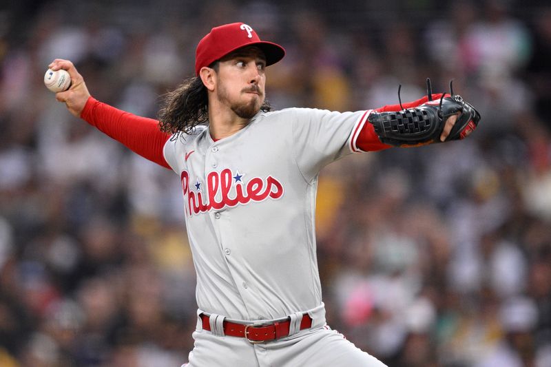 Sep 5, 2023; San Diego, California, USA; Philadelphia Phillies starting pitcher Michael Lorenzen (22) throws a pitch against the San Diego Padres during the first inning at Petco Park. Mandatory Credit: Orlando Ramirez-USA TODAY Sports