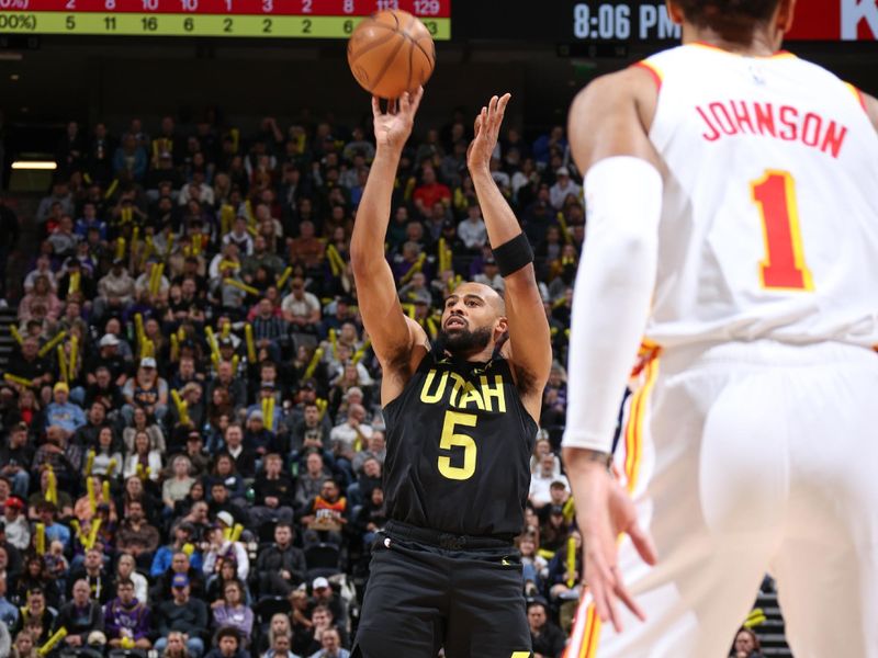 SALT LAKE CITY, UT - MARCH 15:  Talen Horton-Tucker #5 of the Utah Jazz shoots a 3-point basket during the game  on March 15, 2024 at Delta Center in Salt Lake City, Utah. NOTE TO USER: User expressly acknowledges and agrees that, by downloading and or using this Photograph, User is consenting to the terms and conditions of the Getty Images License Agreement. Mandatory Copyright Notice: Copyright 2024 NBAE (Photo by Melissa Majchrzak/NBAE via Getty Images)