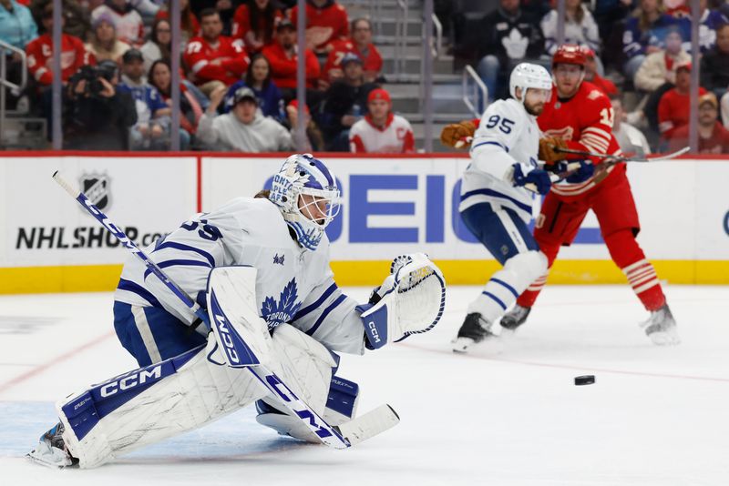 Dec 28, 2025; Detroit, Michigan, USA;  Toronto Maple Leafs goaltender Dennis Hildeby (35) makes the save in the second period against the Detroit Red Wings at Little Caesars Arena. Mandatory Credit: Rick Osentoski-Imagn Images