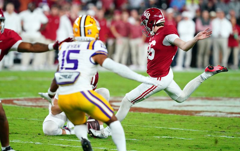 Nov 4, 2023; Tuscaloosa, Alabama, USA;  Alabama Crimson Tide place kicker Will Reichard (16) attempts a field goal against the LSU Tigers during the second quarter at Bryant-Denny Stadium. Mandatory Credit: John David Mercer-USA TODAY Sports