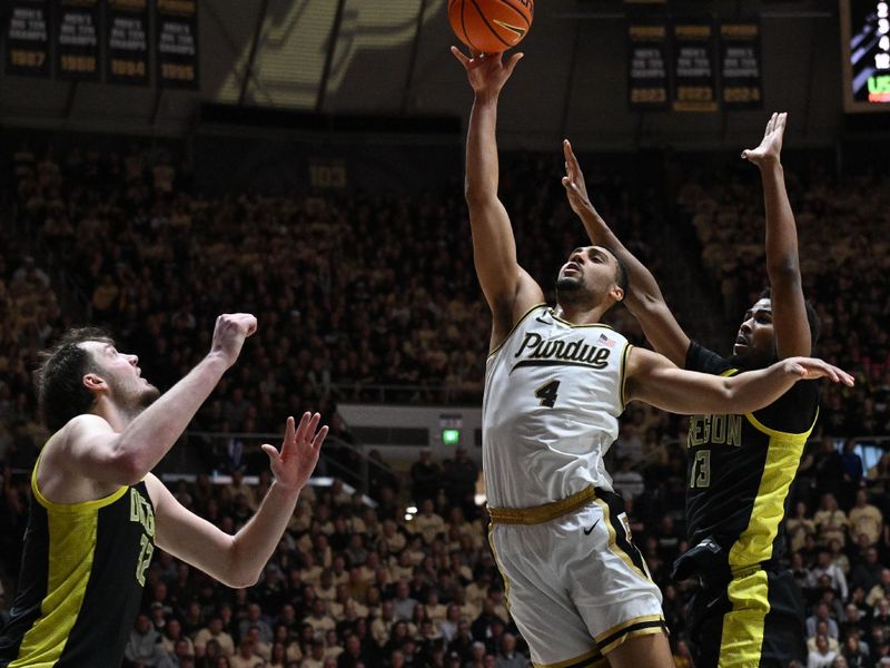 Feb 7, 2026; West Lafayette, Indiana, USA; Purdue Boilermakers forward Trey Kaufman-Renn (4) shoots the ball past Oregon Ducks forward Sean Stewart (13) during the second half at Mackey Arena. Mandatory Credit: Marc Lebryk-Imagn Images