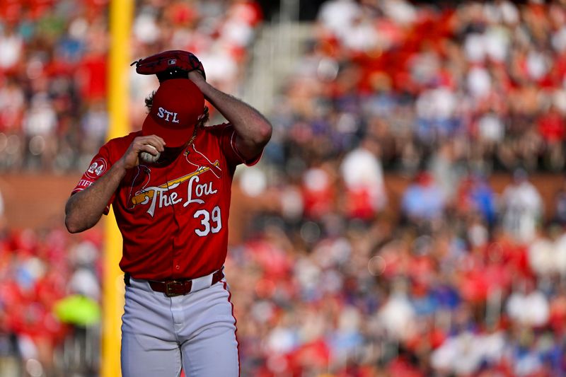 May 25, 2024; St. Louis, Missouri, USA;  St. Louis Cardinals starting pitcher Miles Mikolas (39) prepares  to pitch against the Chicago Cubs during the first inning at Busch Stadium. Mandatory Credit: Jeff Curry-USA TODAY Sports
