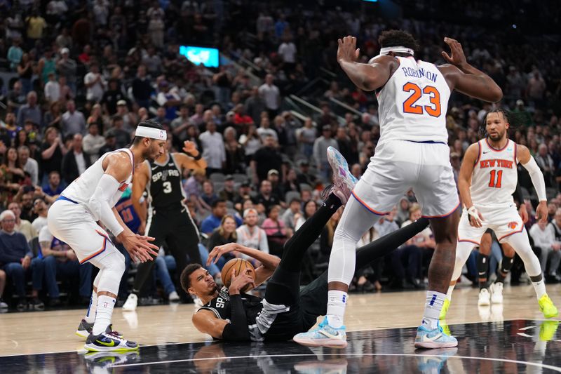 SAN ANTONIO, TX - MARCH 29:  Victor Wembanyama #1 of the San Antonio Spurs handles the ball during the game against the New York Knicks on March 29, 2024 at the Frost Bank Center in San Antonio, Texas. NOTE TO USER: User expressly acknowledges and agrees that, by downloading and or using this photograph, user is consenting to the terms and conditions of the Getty Images License Agreement. Mandatory Copyright Notice: Copyright 2024 NBAE (Photos by Darren Carroll/NBAE via Getty Images)