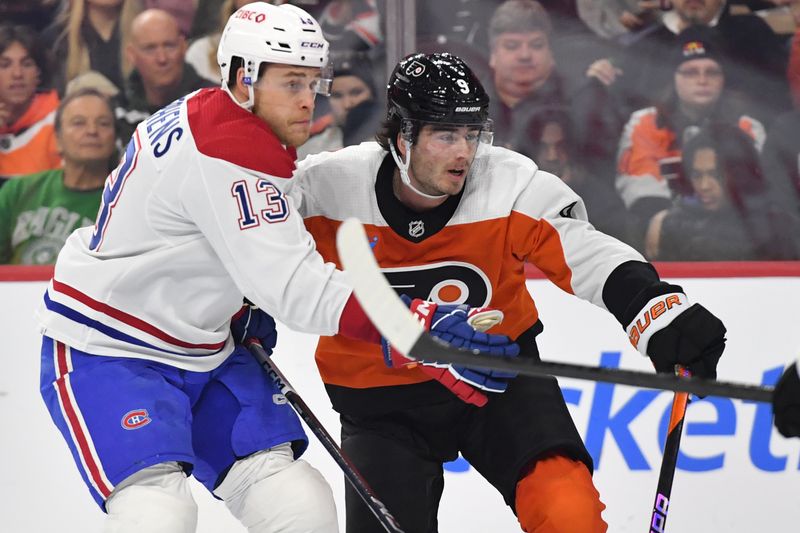 Jan 10, 2024; Philadelphia, Pennsylvania, USA; Montreal Canadiens center Mitchell Stephens (13) and Philadelphia Flyers defenseman Jamie Drysdale (9) battle during the second period at Wells Fargo Center. Mandatory Credit: Eric Hartline-USA TODAY Sports