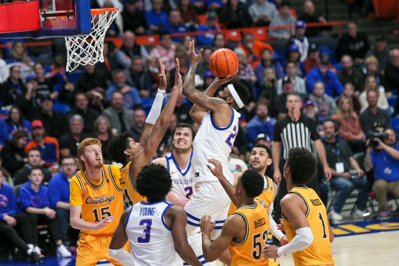 Feb 11, 2023; Boise, Idaho, USA; Boise State Broncos forward Naje Smith (23) puts back a rebound during the second half against the Wyoming Cowboys at ExtraMile Arena. Boise State beats Wyoming 75-63. Mandatory Credit: Brian Losness-USA TODAY Sports

