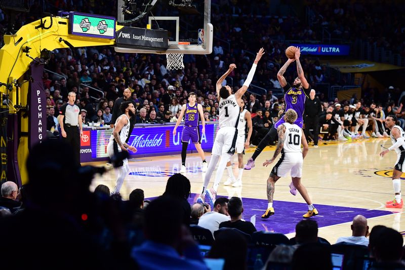 LOS ANGELES, CA - FEBRUARY 23:  Anthony Davis #3 of the Los Angeles Lakers shoots the ball during the game  on February 23, 2024 at Crypto.Com Arena in Los Angeles, California. NOTE TO USER: User expressly acknowledges and agrees that, by downloading and/or using this Photograph, user is consenting to the terms and conditions of the Getty Images License Agreement. Mandatory Copyright Notice: Copyright 2024 NBAE (Photo by Adam Pantozzi/NBAE via Getty Images)