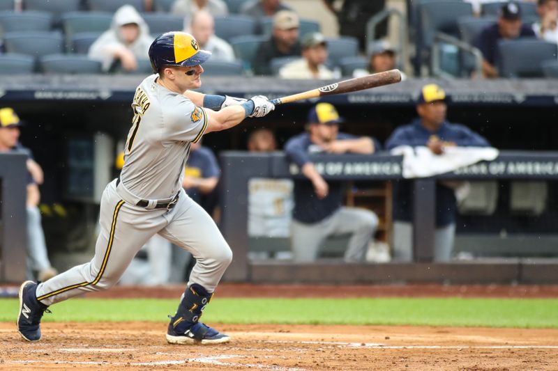 Sep 9, 2023; Bronx, New York, USA;  Milwaukee Brewers right fielder Mark Canha (21) hits a single in the fourth inning against the New York Yankees at Yankee Stadium. Mandatory Credit: Wendell Cruz-USA TODAY Sports