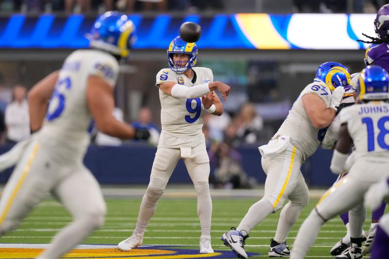 Los Angeles Rams quarterback Matthew Stafford (9) passes during the first half of an NFL football game against the Minnesota Vikings, Thursday, Oct. 24, 2024, in Inglewood, Calif. (AP Photo/Mark J. Terrill)