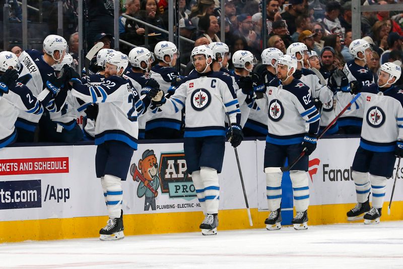 Nov 1, 2024; Columbus, Ohio, USA; Winnipeg Jets center Mason Appleton (22) celebrates his goal against the Columbus Blue Jackets during the second period at Nationwide Arena. Mandatory Credit: Russell LaBounty-Imagn Images