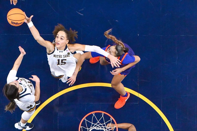 Feb 22, 2024; South Bend, Indiana, USA; Notre Dame Fighting Irish forward Nat Marshall (15) reaches for a rebound in the first half against the Clemson Tigers at the Purcell Pavilion. Mandatory Credit: Matt Cashore-USA TODAY Sports