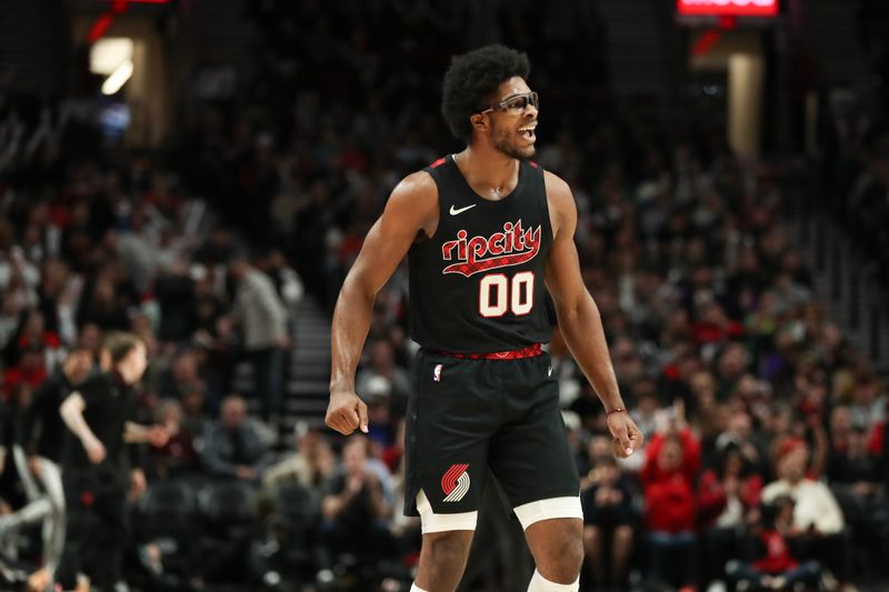 PORTLAND, OREGON - DECEMBER 29: Scoot Henderson #00 of the Portland Trail Blazers reacts to a basket during the third quarter against the San Antonio Spurs at Moda Center on December 29, 2023 in Portland, Oregon. NOTE TO USER: User expressly acknowledges and agrees that, by downloading and or using this photograph, User is consenting to the terms and conditions of the Getty Images License Agreement.? (Photo by Amanda Loman/Getty Images)