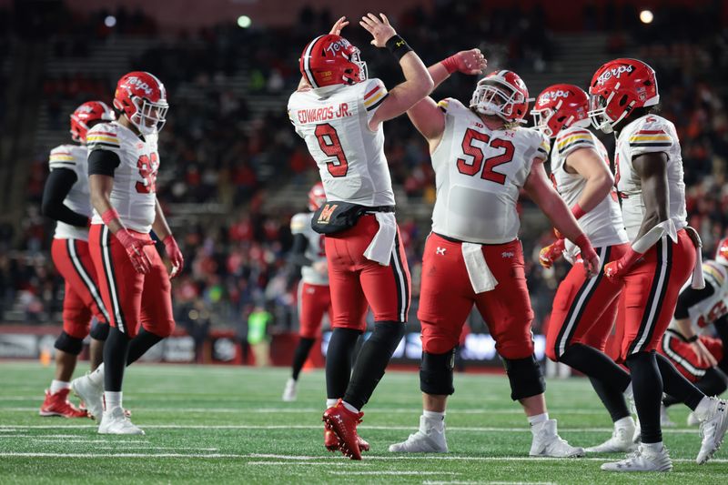 Nov 25, 2023; Piscataway, New Jersey, USA; Maryland Terrapins quarterback Billy Edwards Jr. (9) celebrates his rushing touchdown with offensive lineman Mike Purcell (52) during the second half against the Rutgers Scarlet Knights at SHI Stadium. Mandatory Credit: Vincent Carchietta-USA TODAY Sports