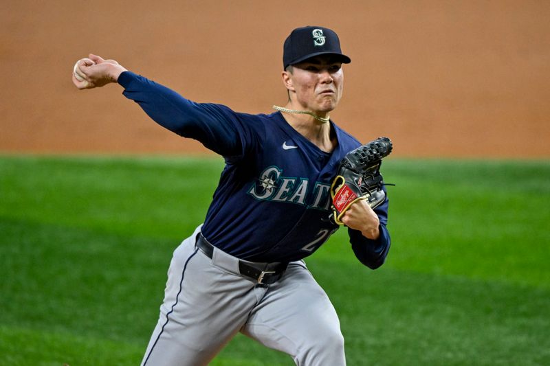 Sep 22, 2024; Arlington, Texas, USA; Seattle Mariners starting pitcher Bryan Woo (22) pitches against the Texas Rangers during the second inning at Globe Life Field. Mandatory Credit: Jerome Miron-Imagn Images