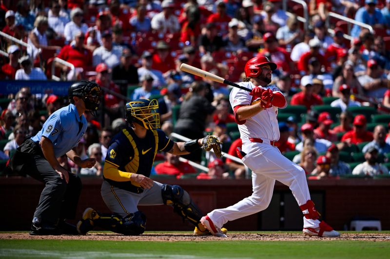 Aug 22, 2024; St. Louis, Missouri, USA;  St. Louis Cardinals first baseman Alec Burleson (41) hits a single against the Milwaukee Brewers during the seventh inning at Busch Stadium. Mandatory Credit: Jeff Curry-USA TODAY Sports