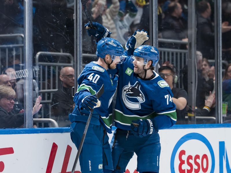 Apr 14, 2026; Vancouver, British Columbia, CAN; Vancouver Canucks forward Elias Pettersson (40) and forward Jake DeBrusk (74) celebrate DeBrusk’s game winning overtime goal at Rogers Arena. Mandatory Credit: Bob Frid-Imagn Images Apr 14, 2026; Vancouver, British Columbia, CAN; Vancouver Canucks forward Elias Pettersson (40) and forward Jake DeBrusk (74) celebrate DeBrusk’s game winning overtime goal at Rogers Arena. Mandatory Credit: Bob Frid-Imagn Images