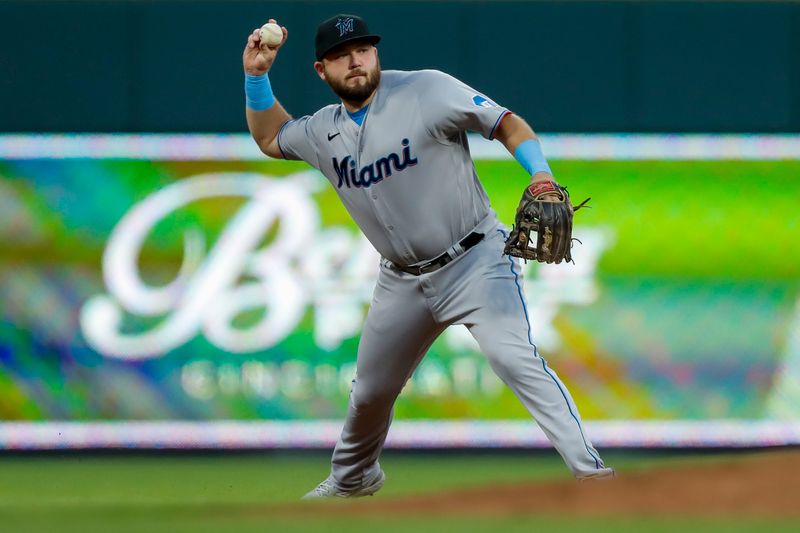 Aug 8, 2023; Cincinnati, Ohio, USA; Miami Marlins third baseman Jake Burger (36) throws to first to get Cincinnati Reds designated hitter Kevin Newman (not pictured) out in the sixth inning at Great American Ball Park. Mandatory Credit: Katie Stratman-USA TODAY Sports