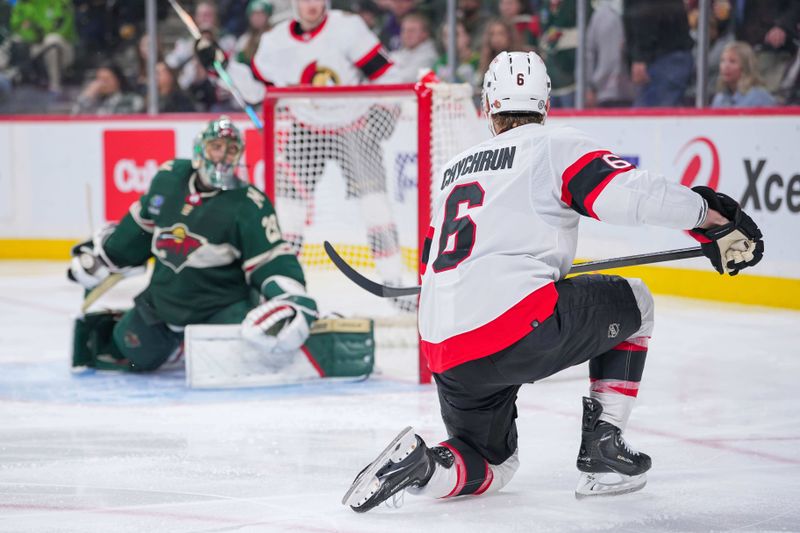 Apr 2, 2024; Saint Paul, Minnesota, USA; Ottawa Senators defenseman Jakob Chychrun (6) scores against the Minnesota Wild goaltender Marc-Andre Fleury (29) in the third period at Xcel Energy Center. Mandatory Credit: Brad Rempel-USA TODAY Sports